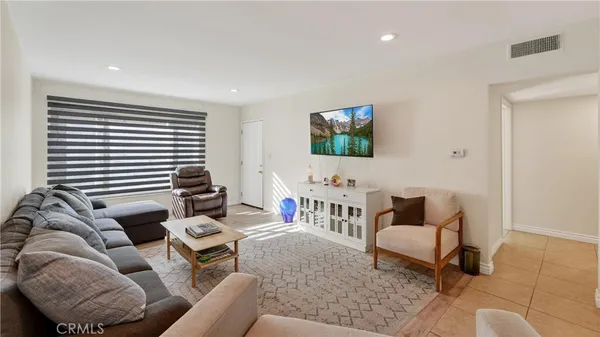 a living room with furniture and a couch