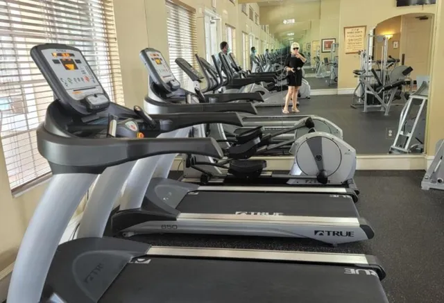 a view of a backyard with sitting area