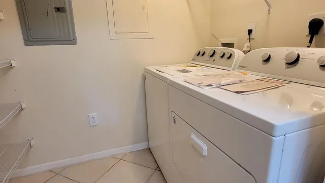 a utility room with dryer and washer
