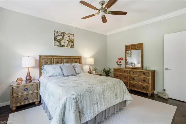 a bathroom with a granite countertop sink a toilet and a tub