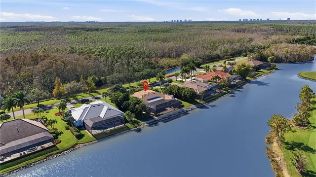 a view of a chairs and table in the patio