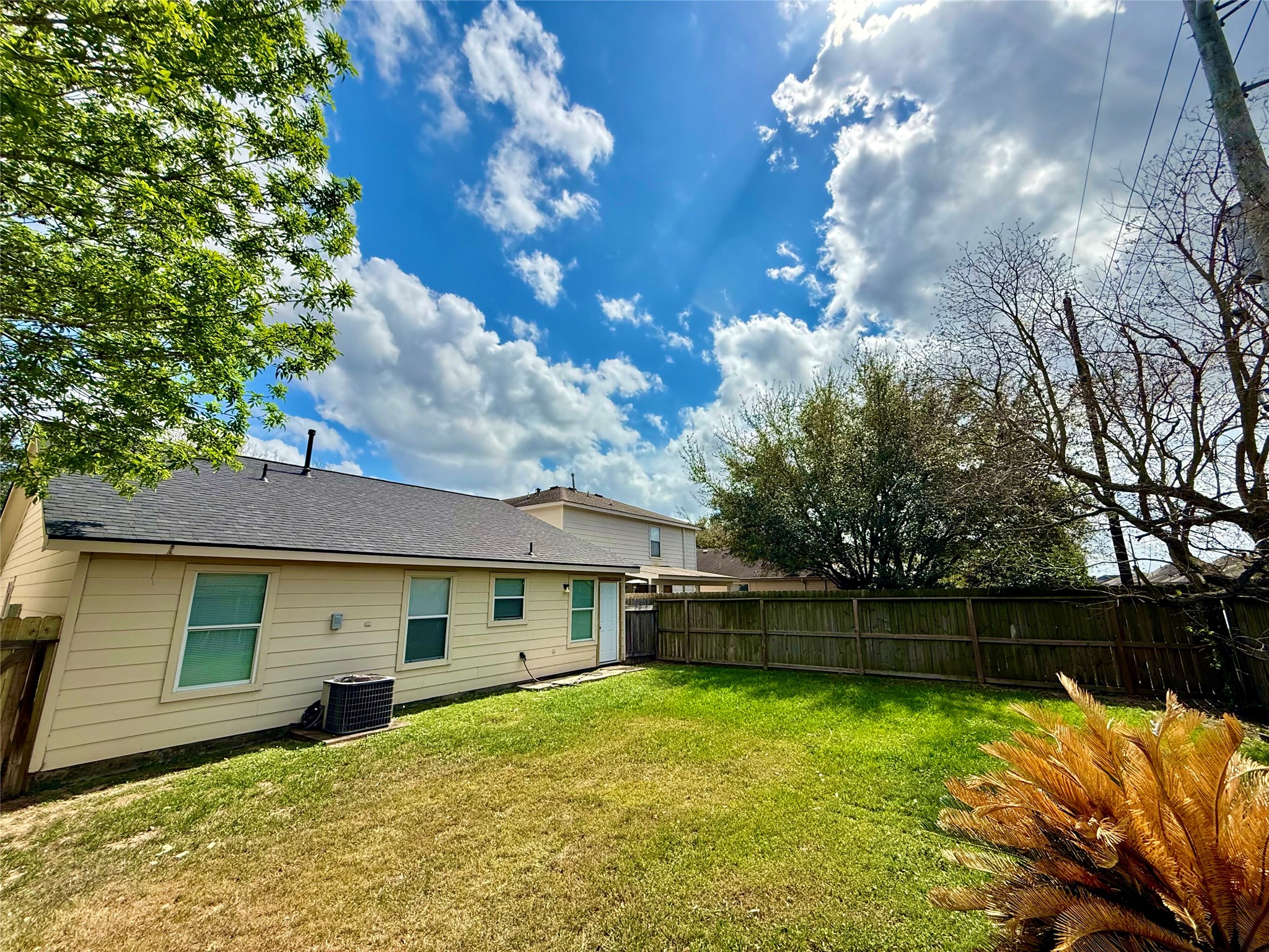 3819 Banks Ridge Lane Katy, TX 77449 - Photo 13 of 13 a view of a house with backyard and garden
