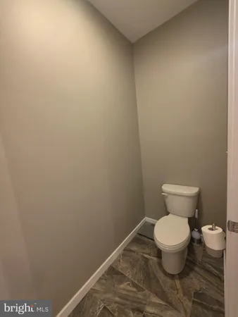 a bathroom with a toilet