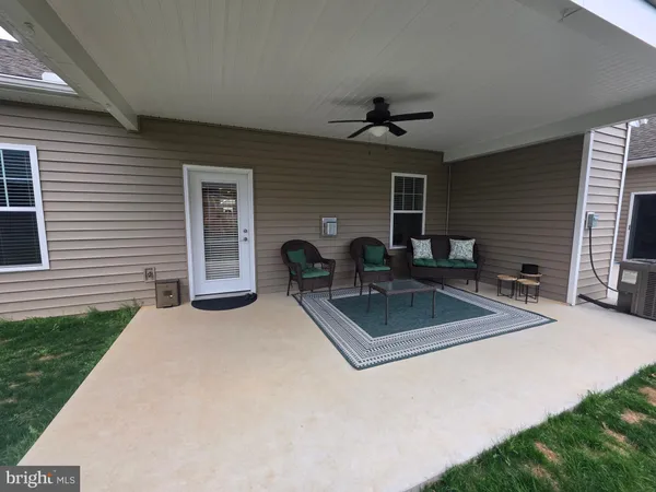 a view of a house with a patio