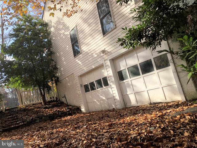 7325 Peppermill Road King George, VA 22485 - Photo 15 of 16 Drive under two car garage.