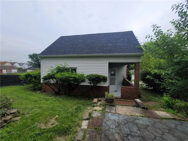a house view with a garden space
