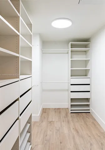 a view of a room with storage and utility room