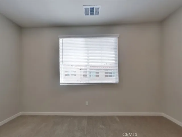 a view of a small space with a window