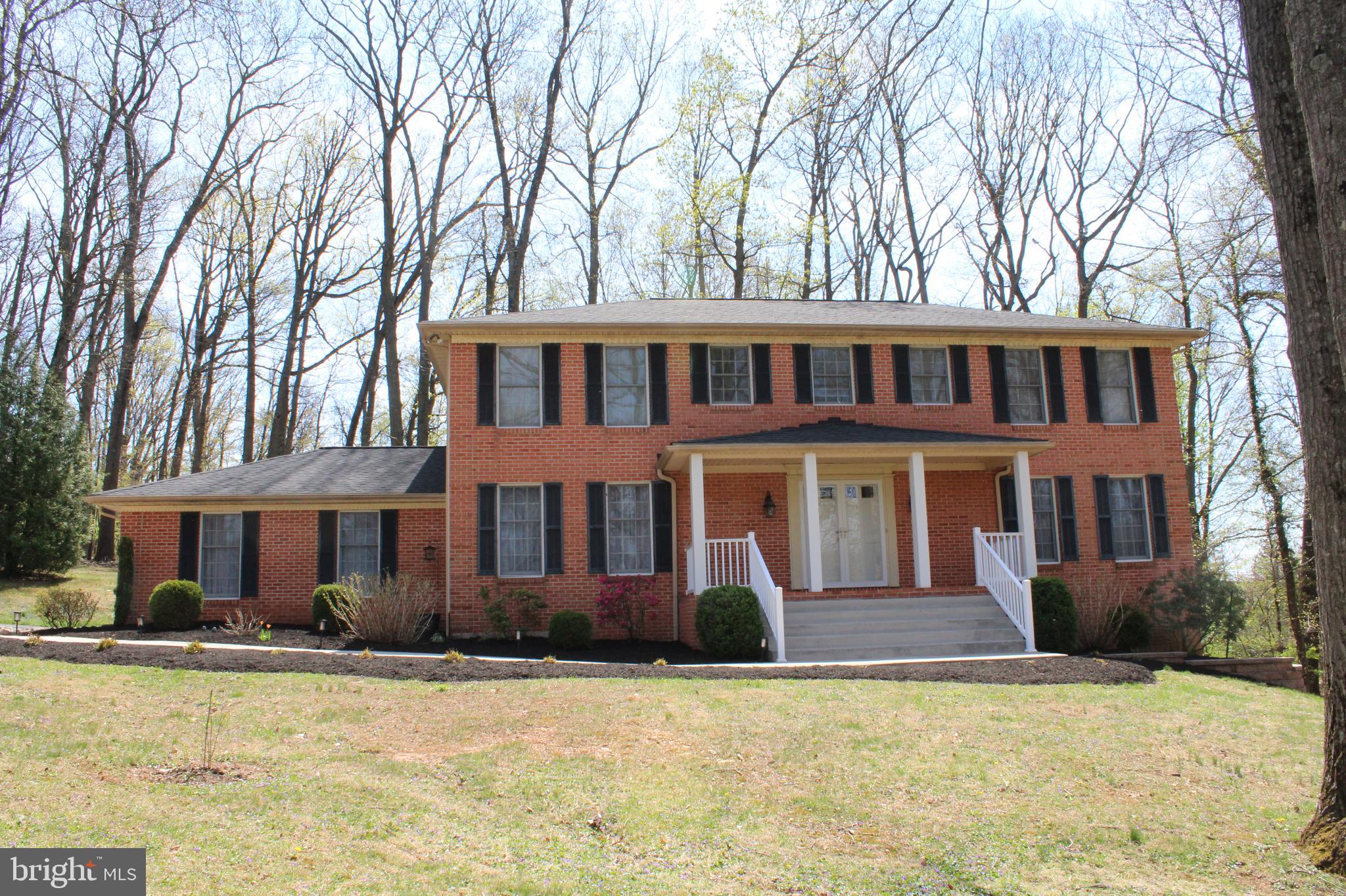 4036 Roop Road New Windsor, MD 21776 - Photo 2 of 8 Front View of Colonial Home