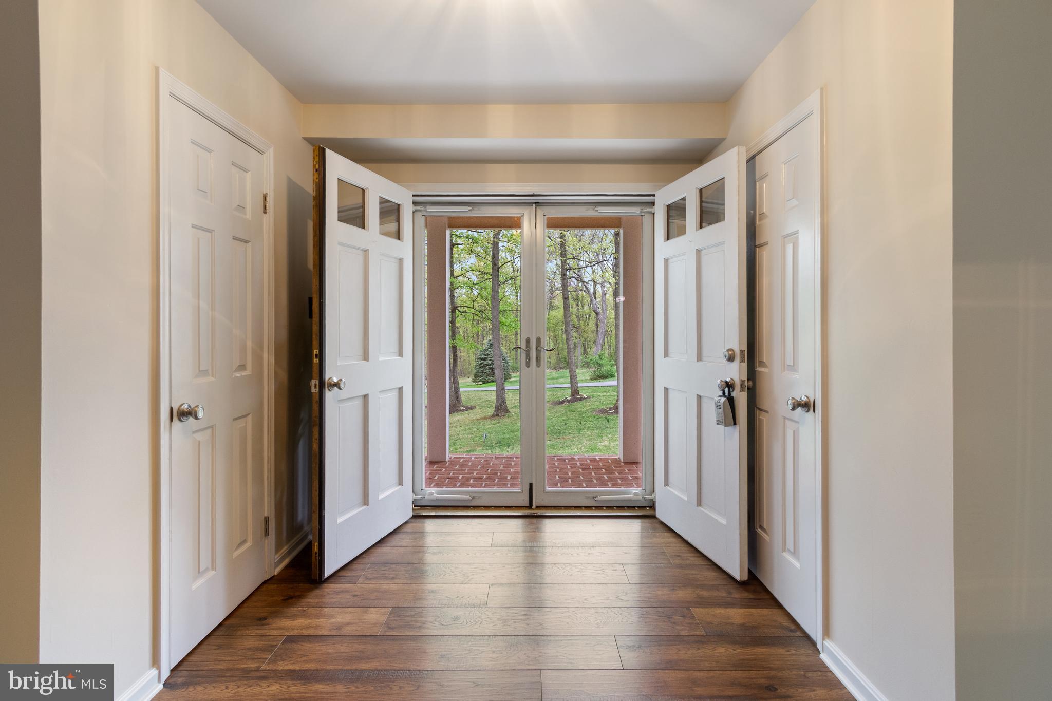 4036 Roop Road New Windsor, MD 21776 - Photo 22 of 55 a view of a big room with wooden floor and windows