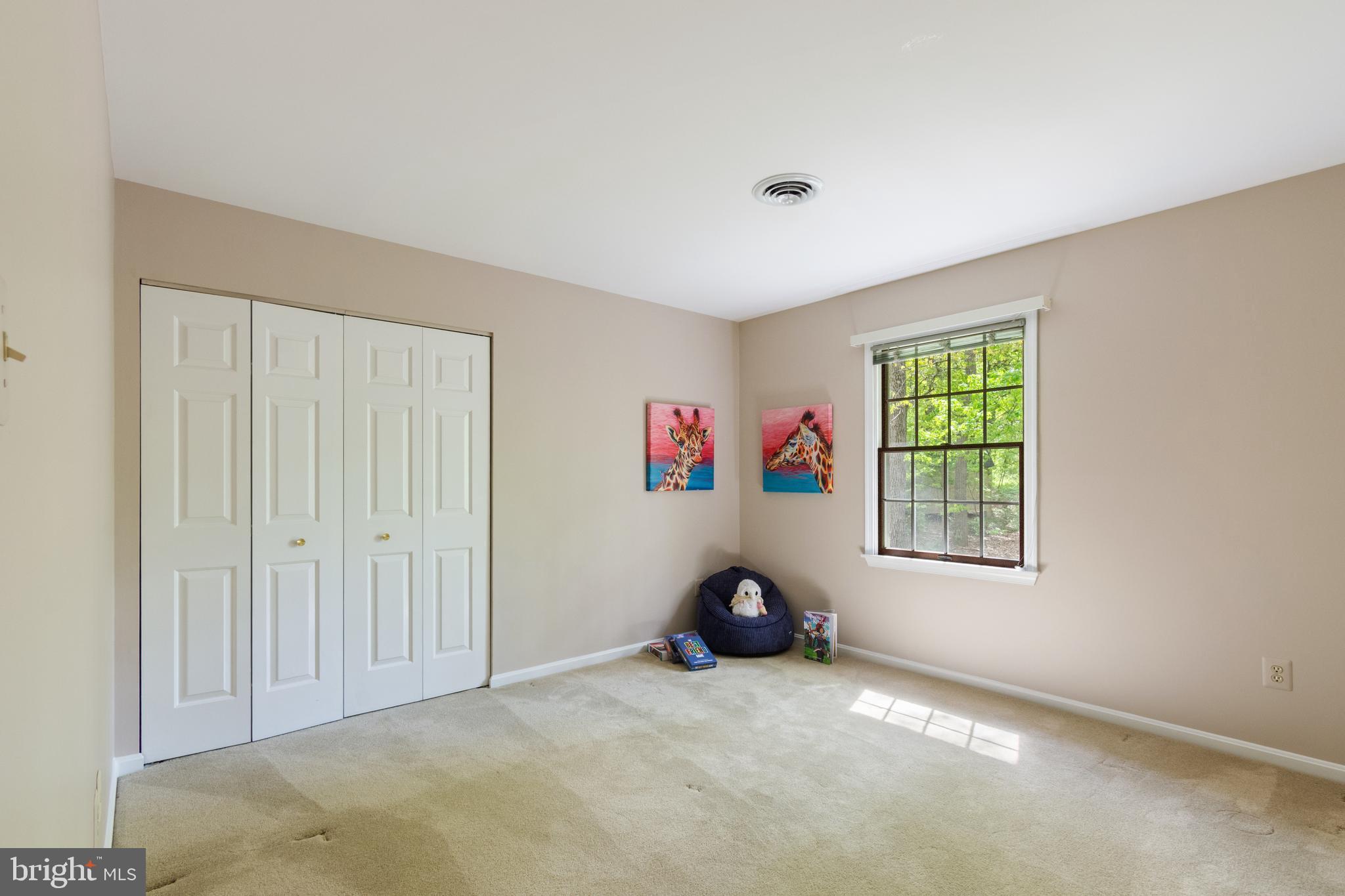 4036 Roop Road New Windsor, MD 21776 - Photo 38 of 55 an empty room with windows and cabinet
