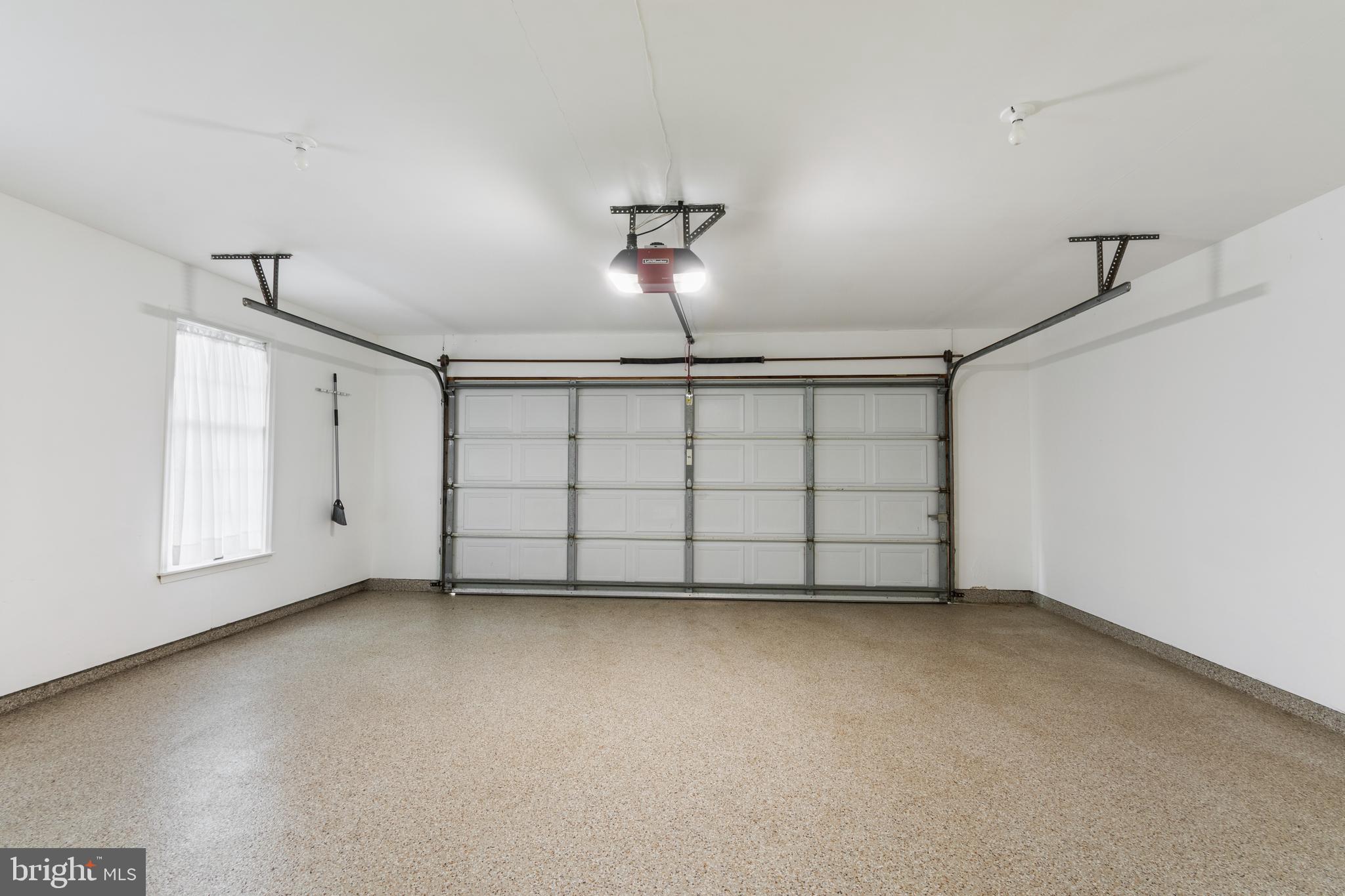 4036 Roop Road New Windsor, MD 21776 - Photo 44 of 55 Oversized Garage with Pebbled Floor