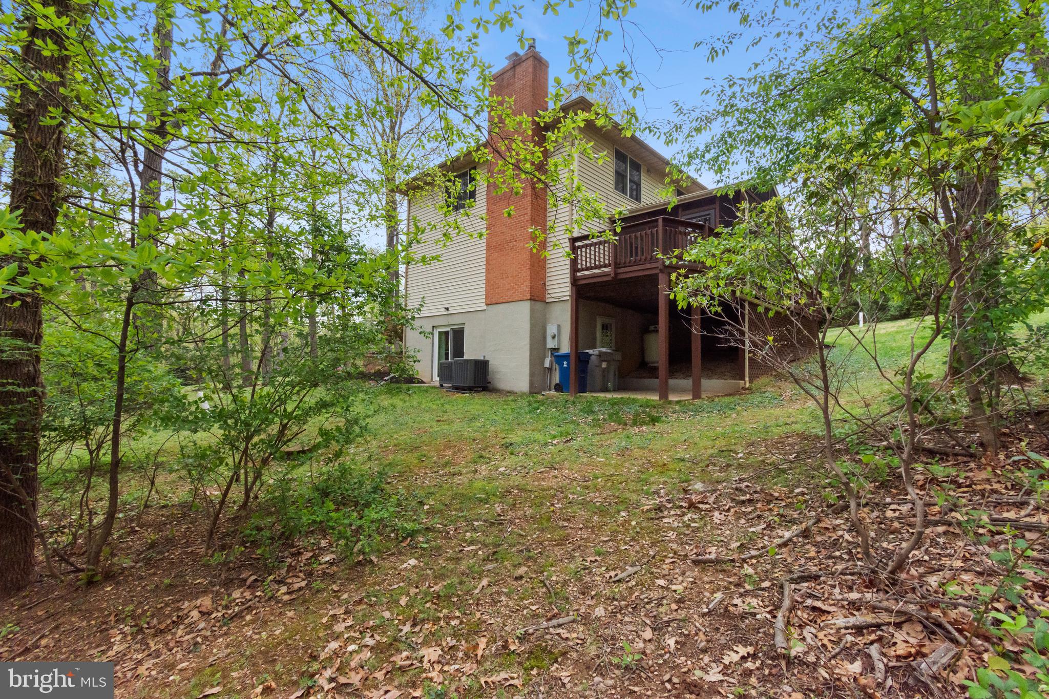 4036 Roop Road New Windsor, MD 21776 - Photo 46 of 55 a view of a house with a yard