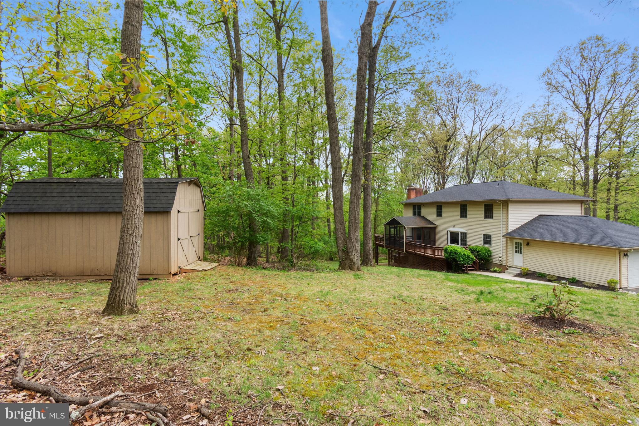 4036 Roop Road New Windsor, MD 21776 - Photo 47 of 55 a yellow house in middle of the forest