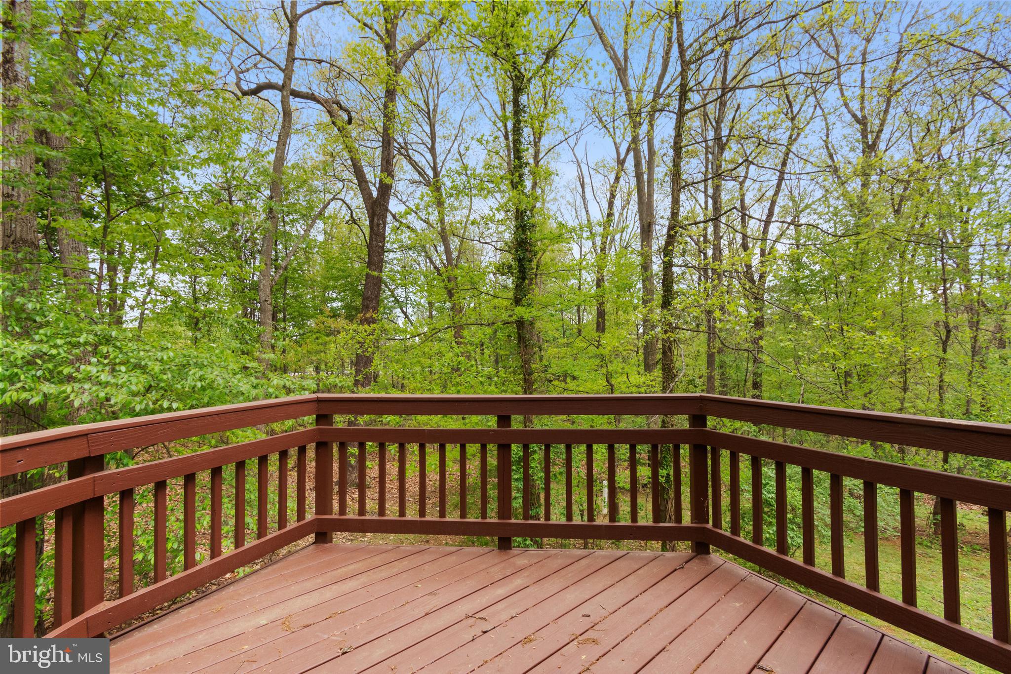 4036 Roop Road New Windsor, MD 21776 - Photo 50 of 55 a view of balcony with wooden floor and fence