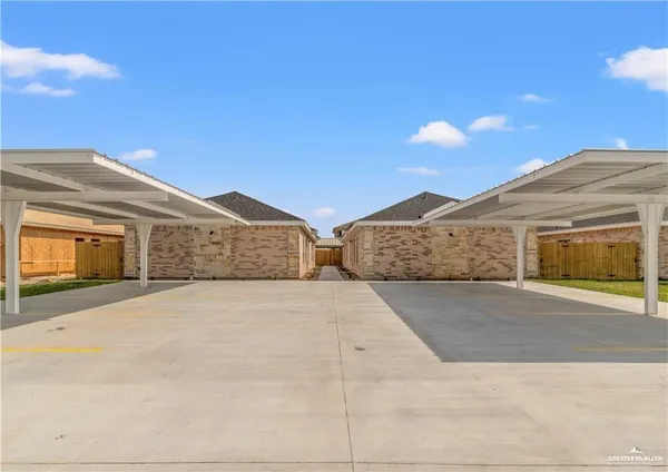 a view of large house with a garage