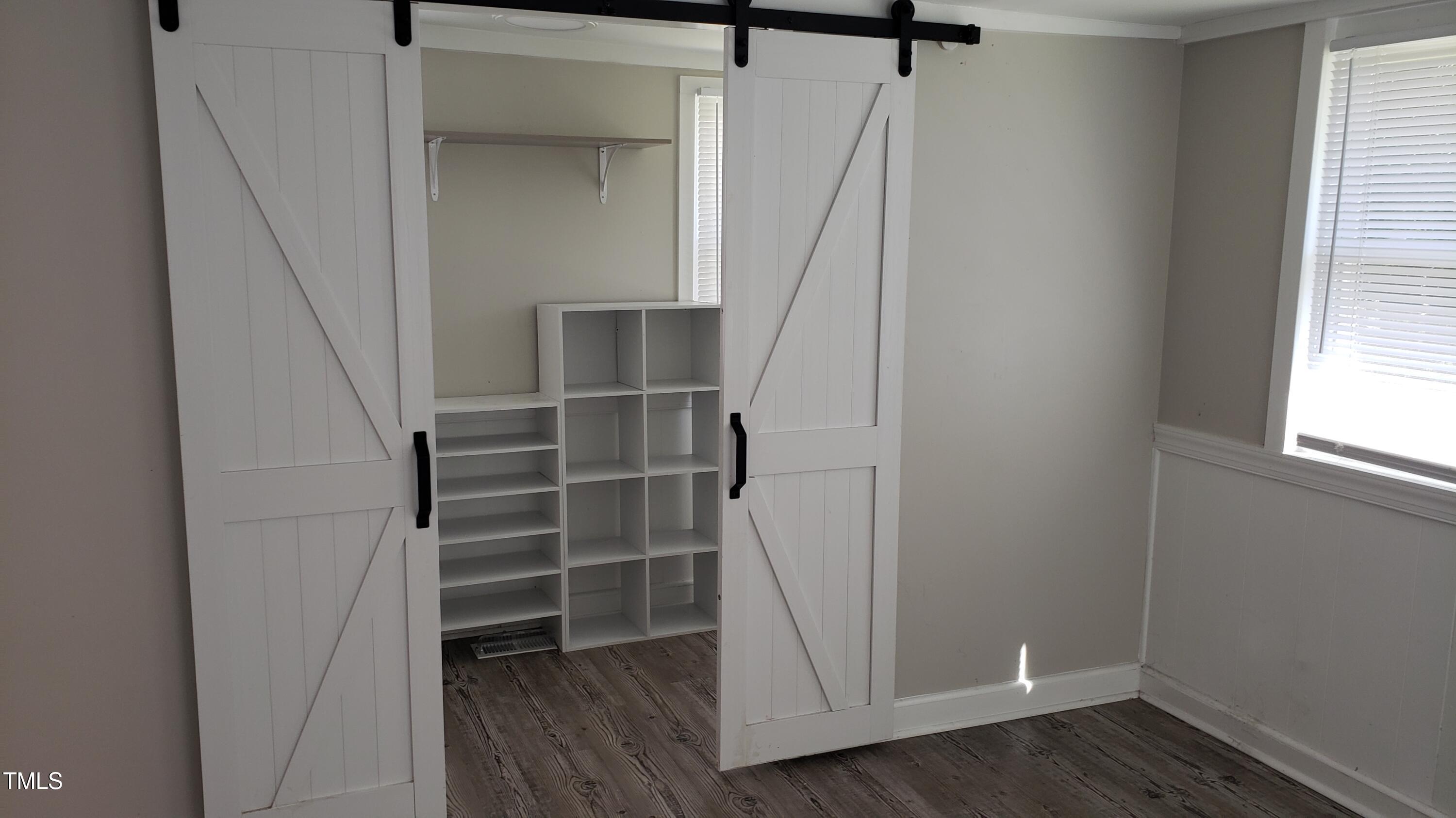 2739 Layden Street Raleigh, NC 27603 - Photo 6 of 10 a view of walk in closet with empty racks