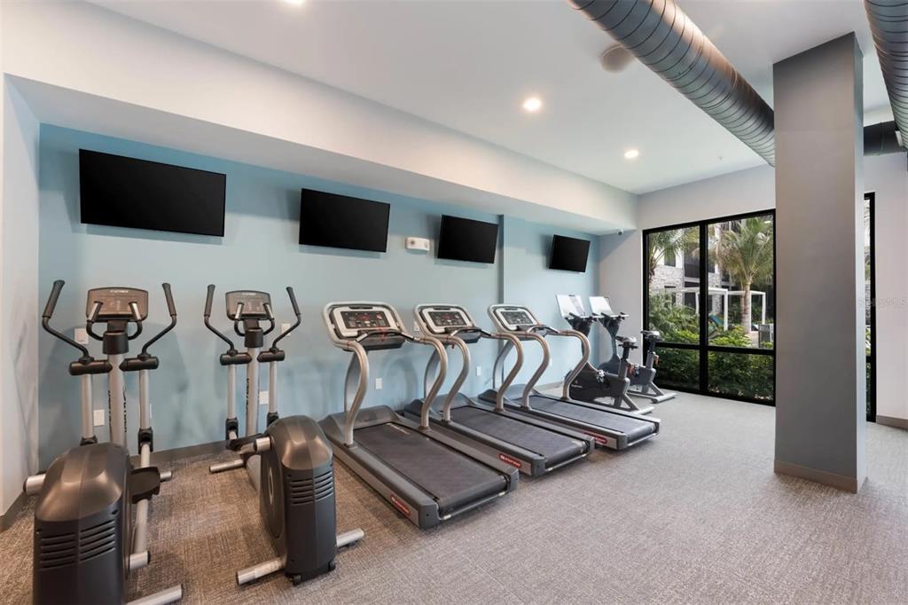 2201 Northwest Federal Highway, Unit 2B1314 Stuart, FL 34994 - Photo 31 of 47 a view of a room with gym equipment