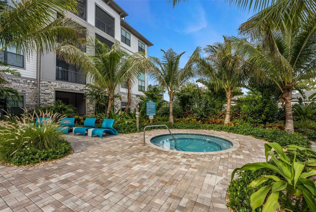 2201 Northwest Federal Highway, Unit 2B1314 Stuart, FL 34994 - Photo 41 of 47 a view of a swimming pool with a patio