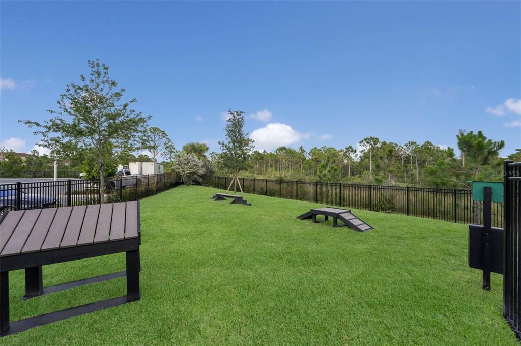 2201 Northwest Federal Highway, Unit 2B1314 Stuart, FL 34994 - Photo 44 of 47 a view of a backyard with a garden