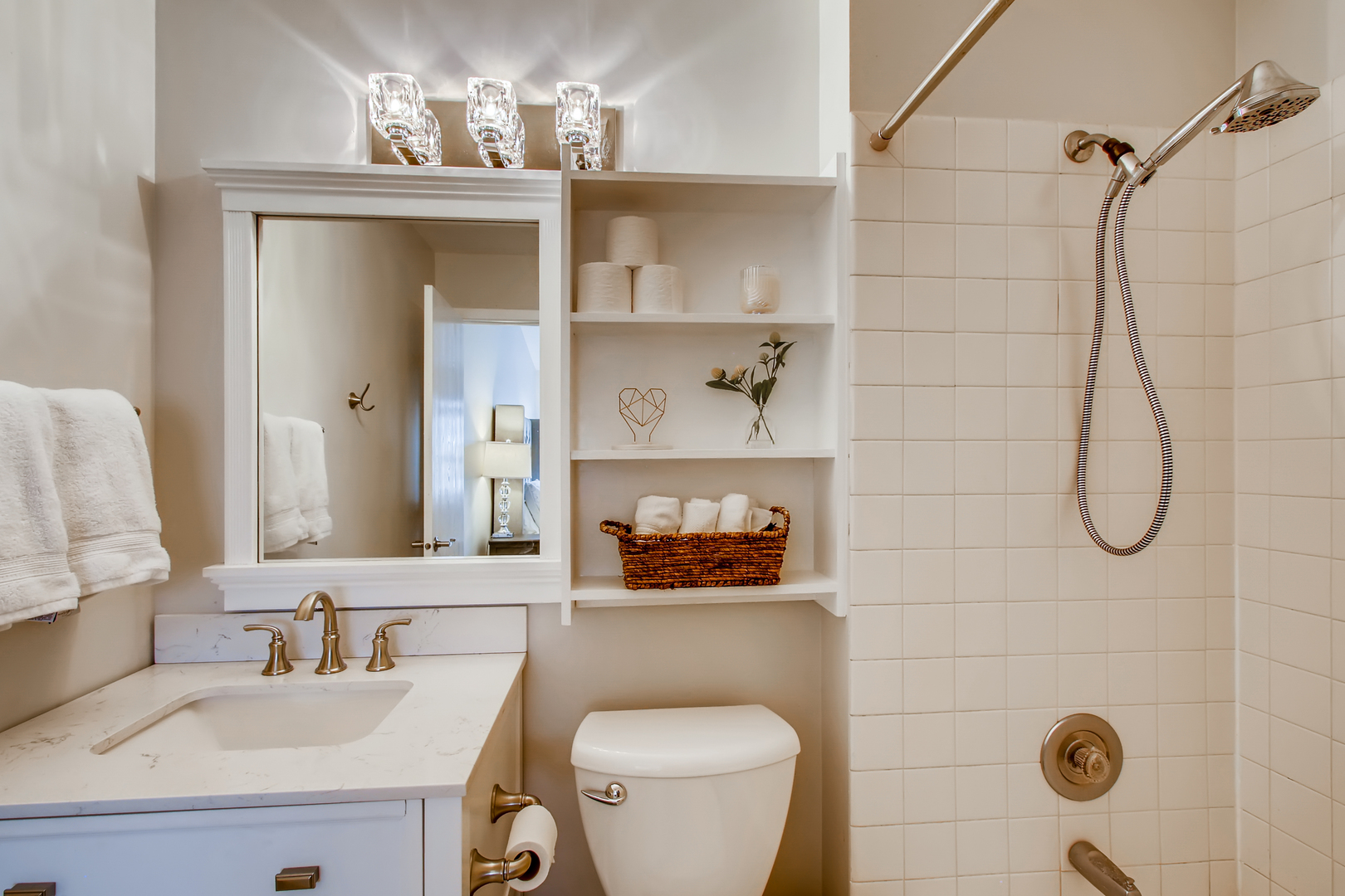 140 West Golf Road, Unit B Libertyville, IL 60048 - Photo 12 of 14 a bathroom with a sink a toilet and shower