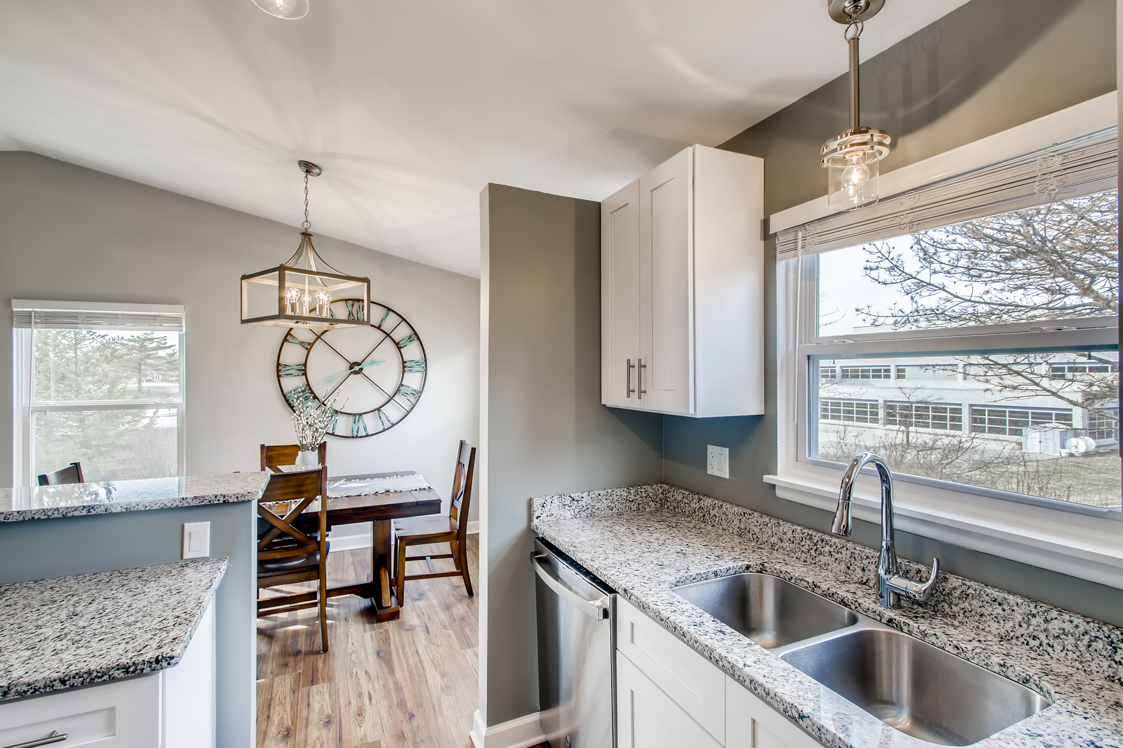 140 West Golf Road, Unit B Libertyville, IL 60048 - Photo 5 of 14 a kitchen with a sink cabinets and window