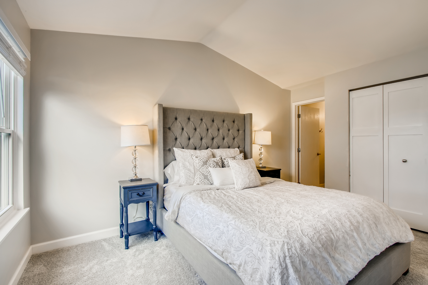 140 West Golf Road, Unit B Libertyville, IL 60048 - Photo 10 of 14 a bedroom with a bed and a night stand