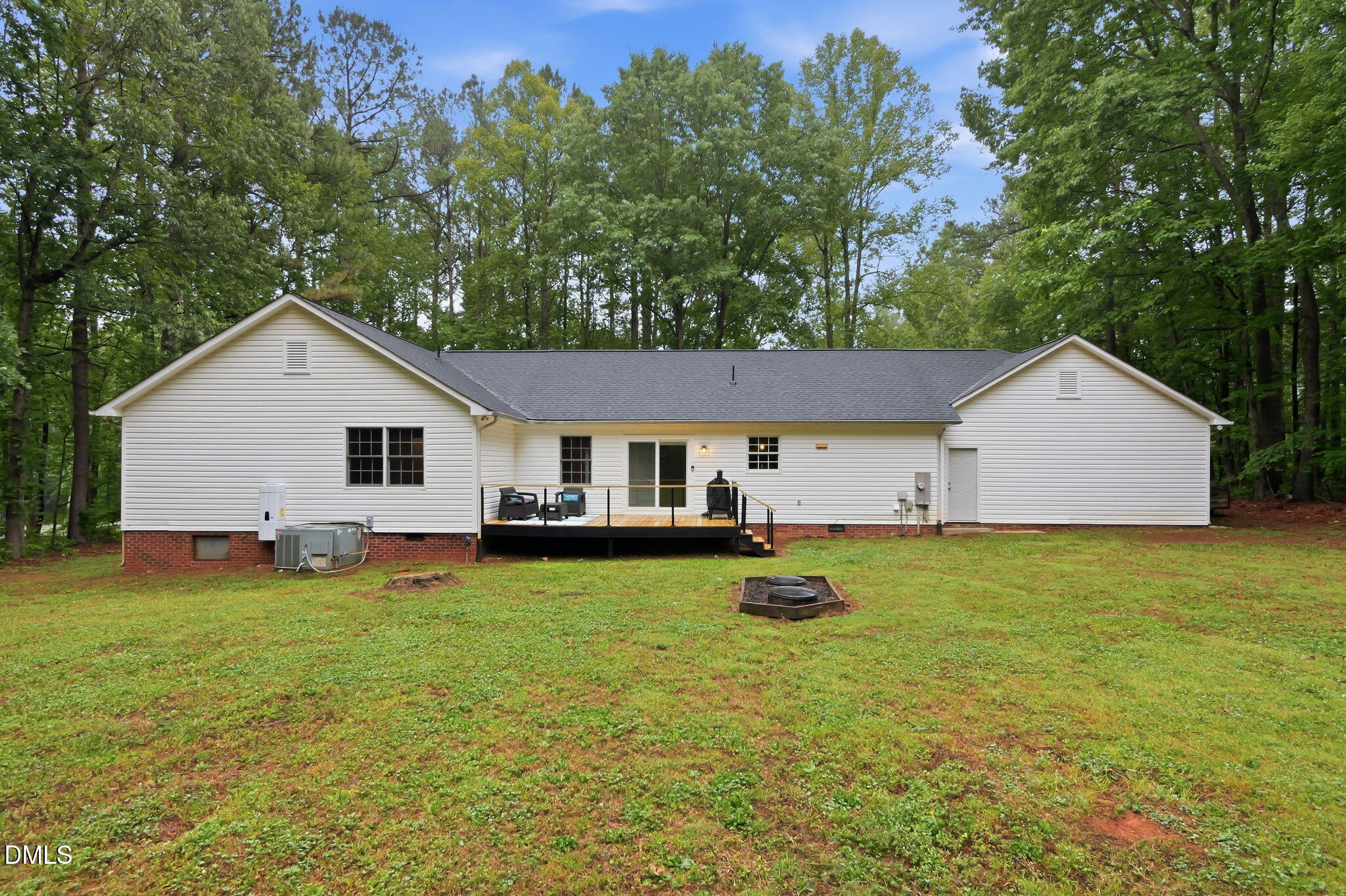 1925 Old Allensville Road Roxboro, NC 27574 - Photo 13 of 58 a view of a house with a yard and sitting area