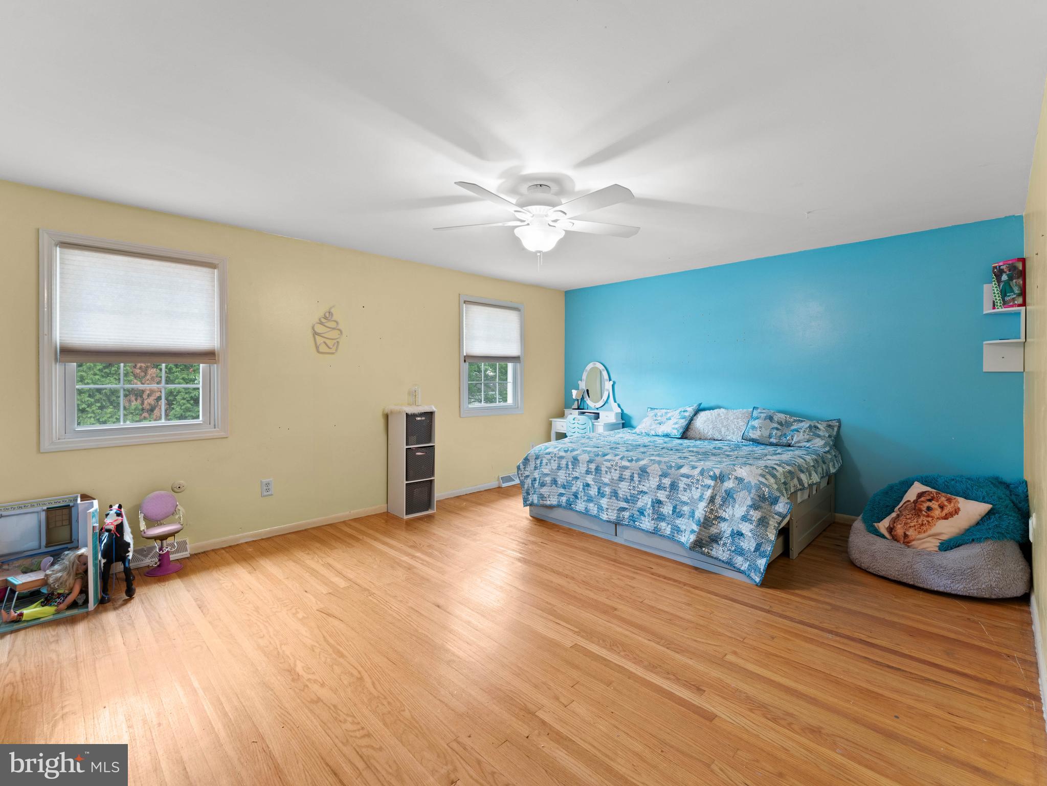 2505 Yellowstone Road Cinnaminson, NJ 08077 - Photo 14 of 40 a bedroom with a bed and wooden floor