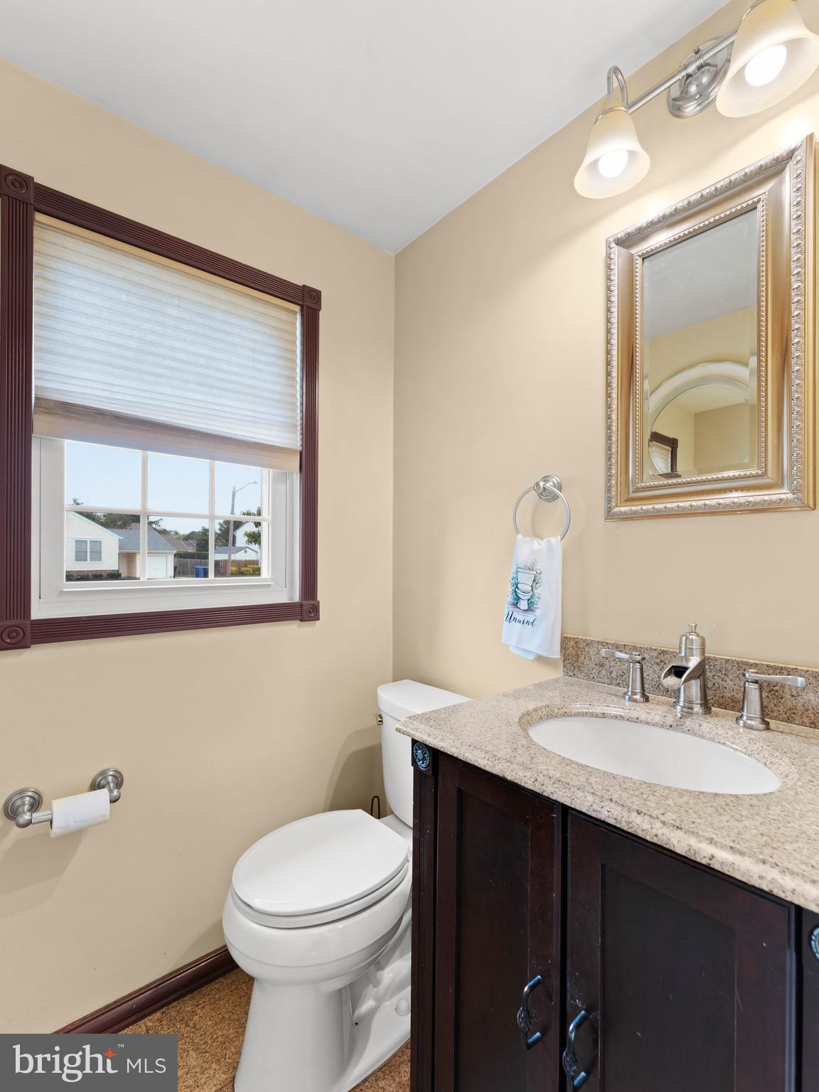 2505 Yellowstone Road Cinnaminson, NJ 08077 - Photo 19 of 40 a bathroom with a granite countertop toilet sink and mirror