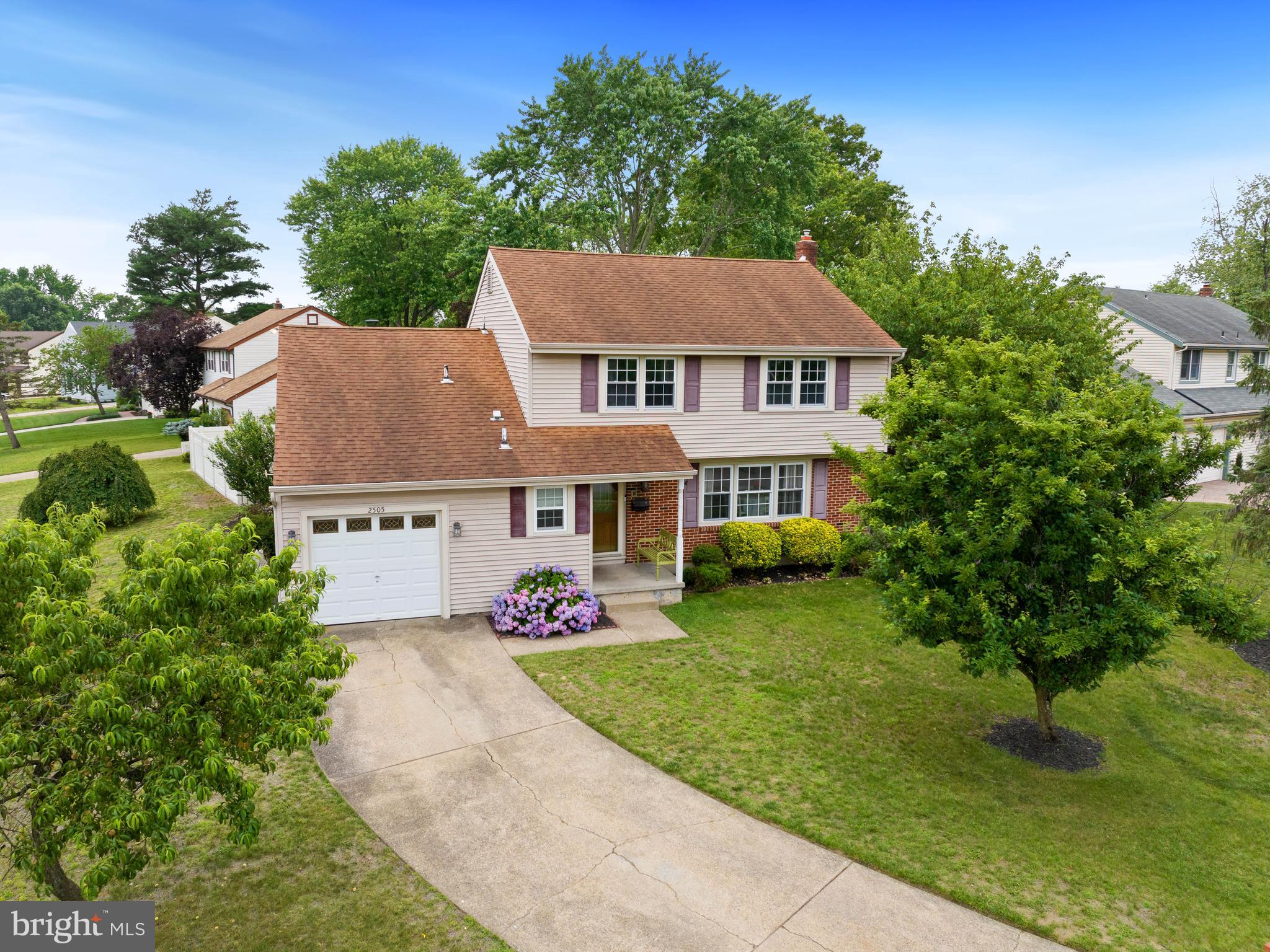 2505 Yellowstone Road Cinnaminson, NJ 08077 - Photo 2 of 40 a front view of a house with garden