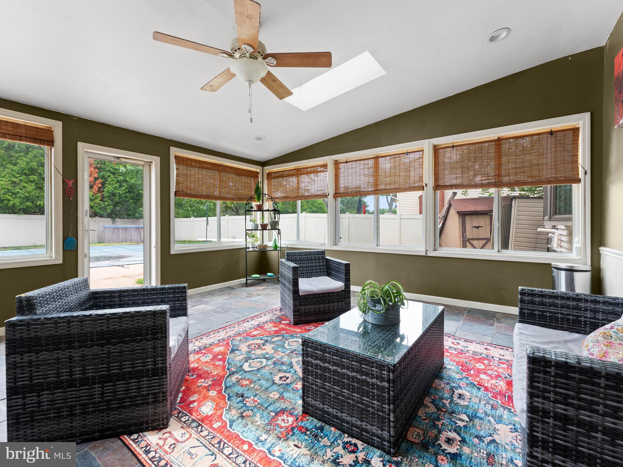 2505 Yellowstone Road Cinnaminson, NJ 08077 - Photo 30 of 40 a living room with furniture and a floor to ceiling window