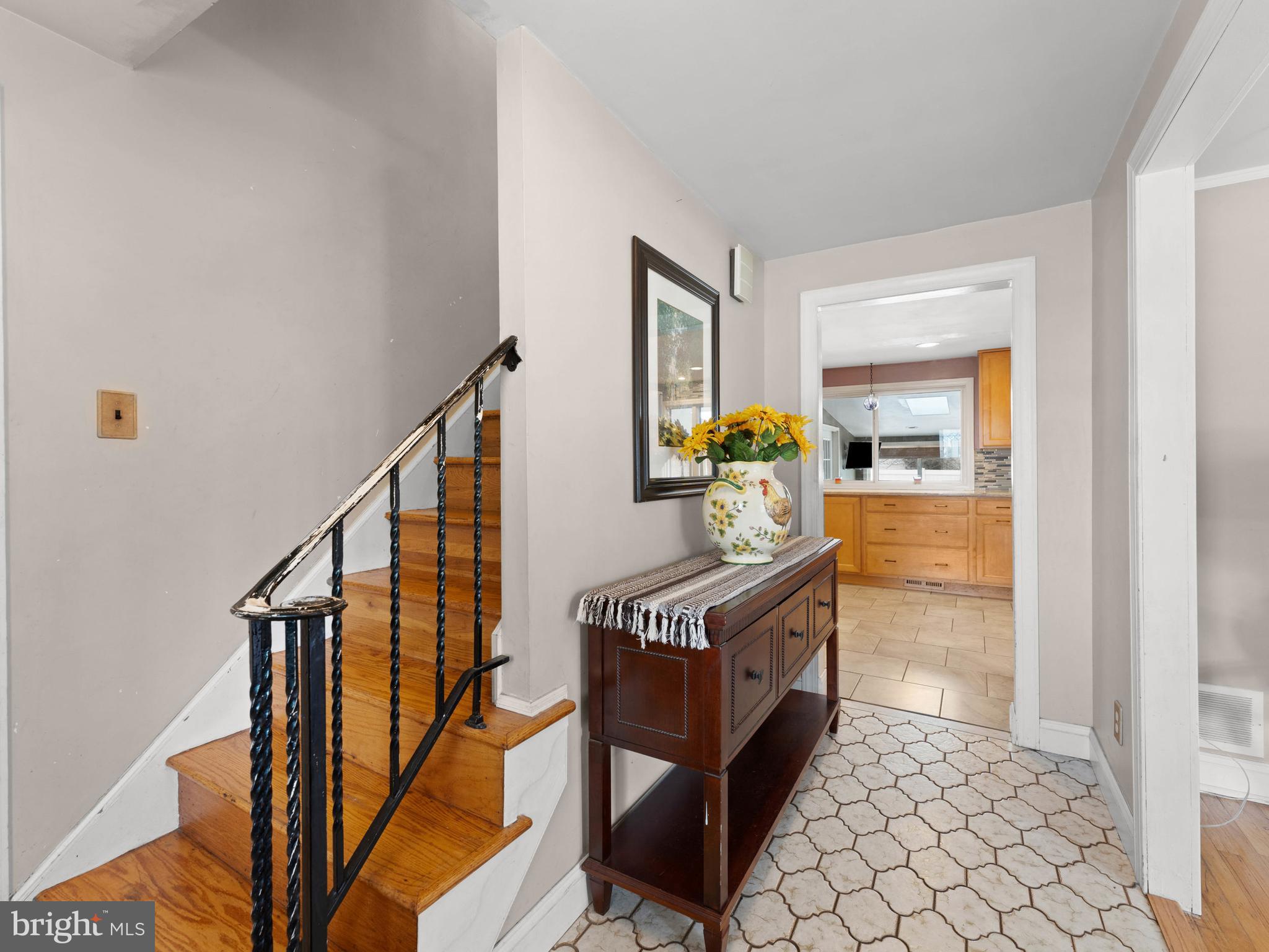 2505 Yellowstone Road Cinnaminson, NJ 08077 - Photo 5 of 40 a view of a hallway with wooden floor and staircase