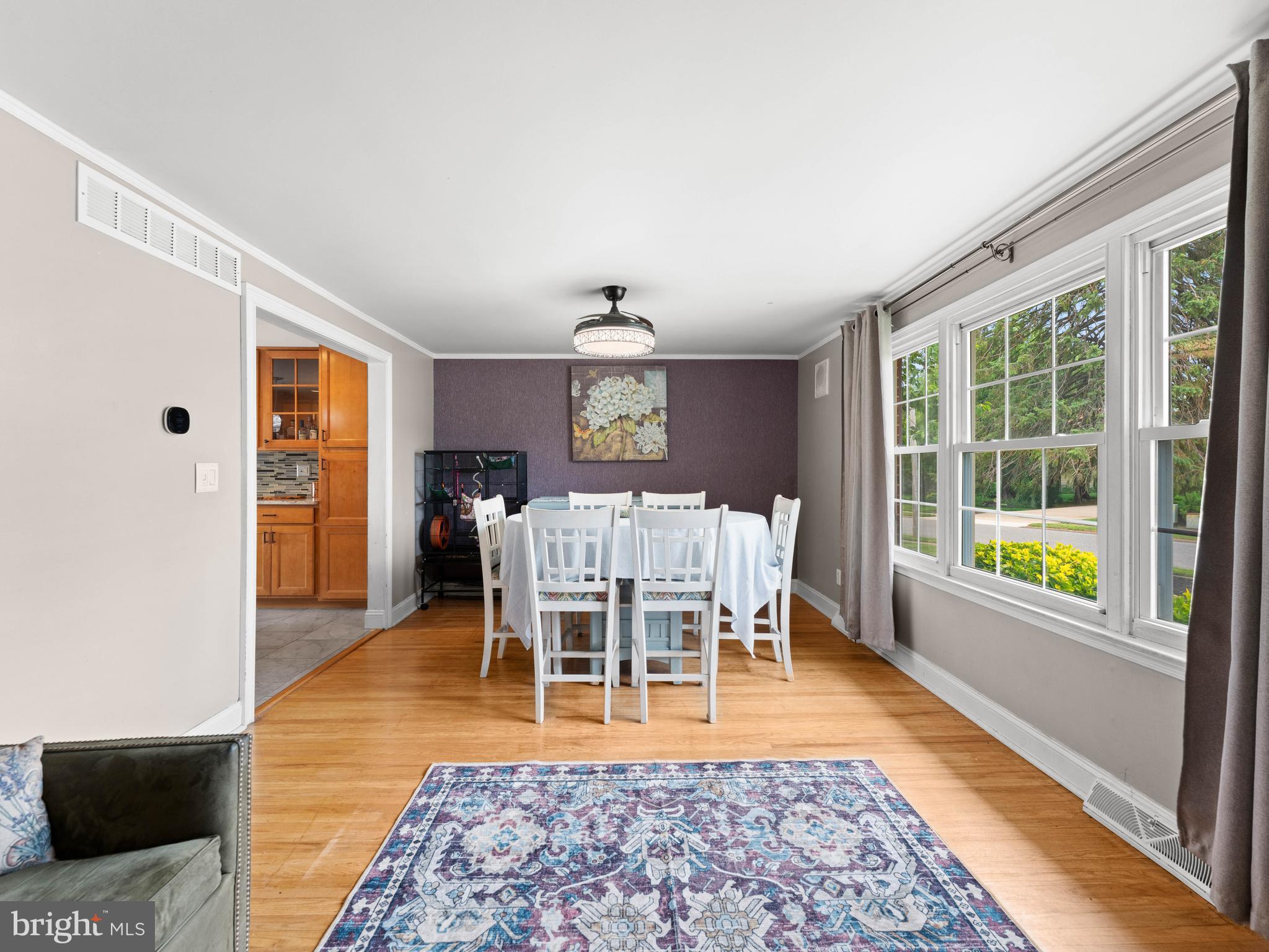 2505 Yellowstone Road Cinnaminson, NJ 08077 - Photo 6 of 40 a dining room with furniture a rug and wooden floor
