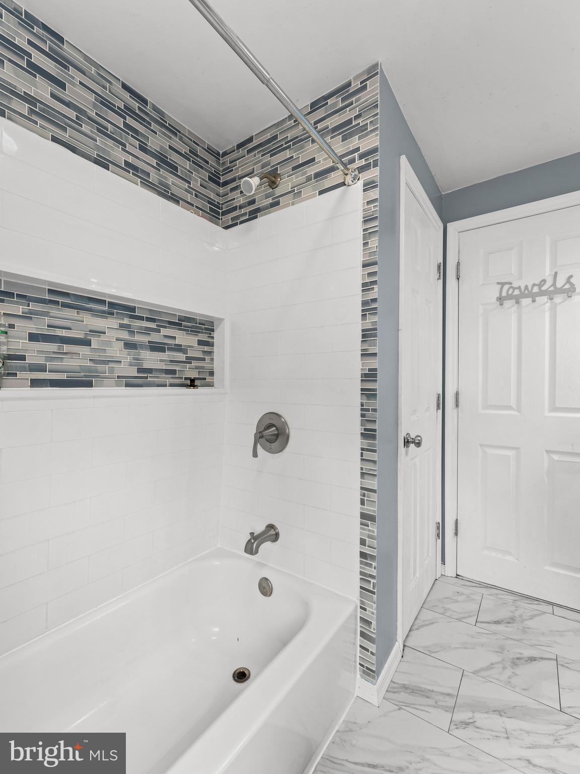 2505 Yellowstone Road Cinnaminson, NJ 08077 - Photo 8 of 40 a bathroom with a bathtub and a shower