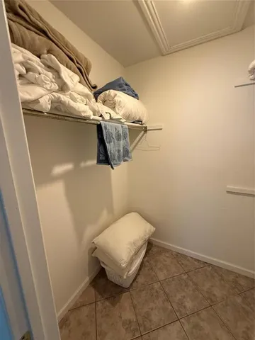 a bathroom with a toilet and shower