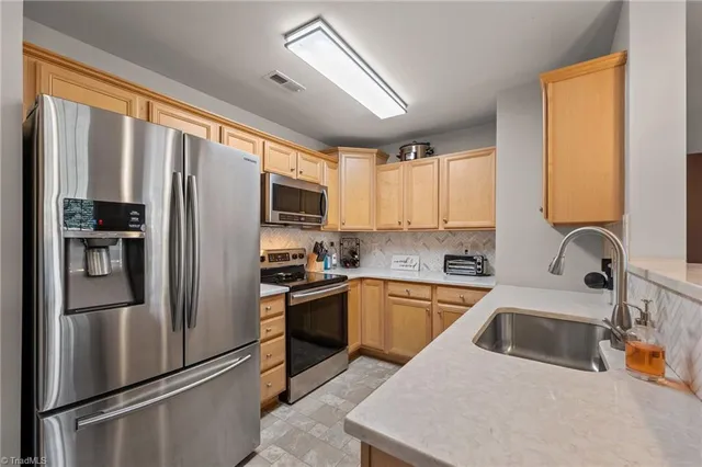 $185,000 | 4702 Pennoak Lane, Greensboro, NC 27407