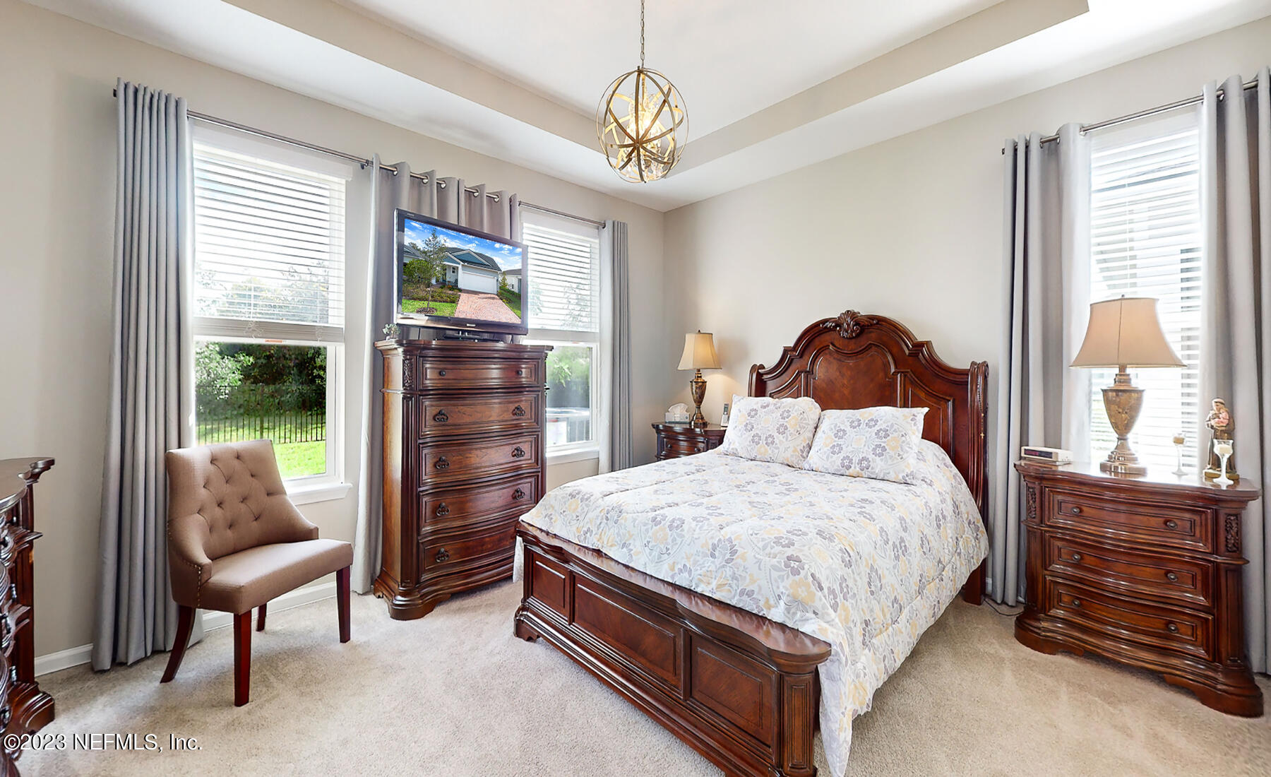 1113 Rustic Ml Drive St. Augustine, FL 32092 - Photo 19 of 62 a bed room with a bed and a dresser