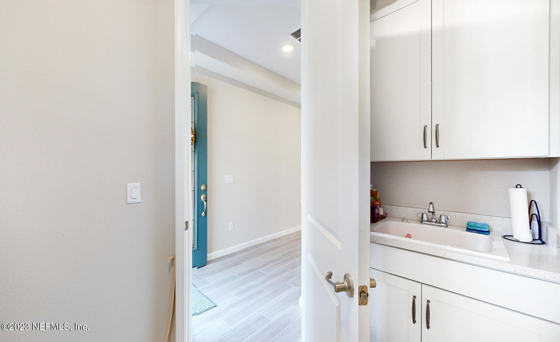 1113 Rustic Ml Drive St. Augustine, FL 32092 - Photo 24 of 62 a view of cabinets and wooden floor