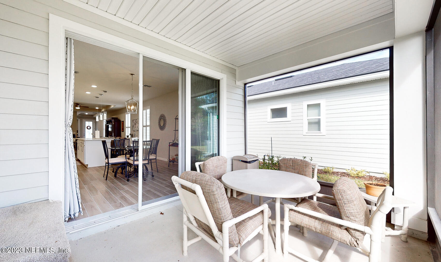 1113 Rustic Ml Drive St. Augustine, FL 32092 - Photo 27 of 62 a balcony with table and chairs