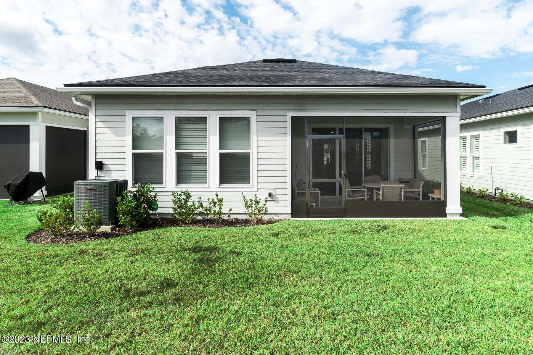 1113 Rustic Ml Drive St. Augustine, FL 32092 - Photo 28 of 62 a front view of a house with a yard
