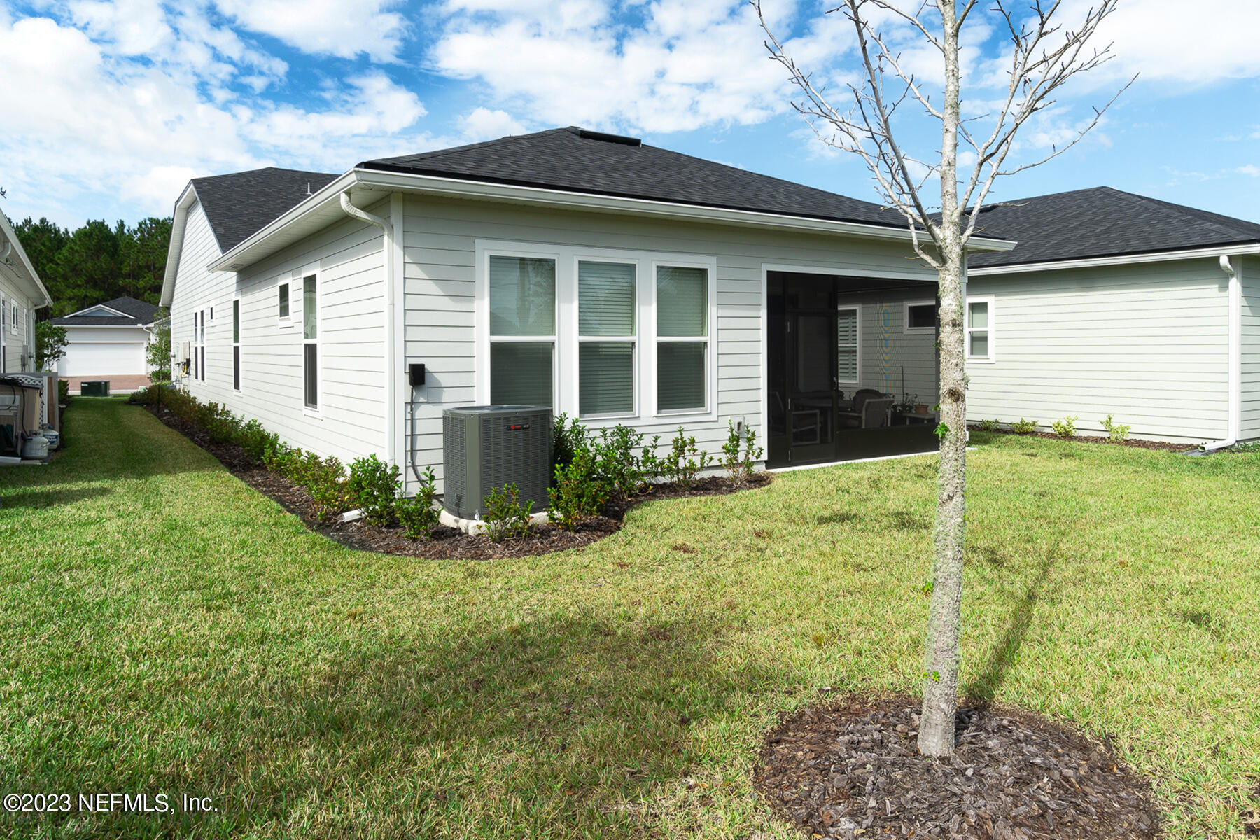 1113 Rustic Ml Drive St. Augustine, FL 32092 - Photo 29 of 62 a front view of a house with garden
