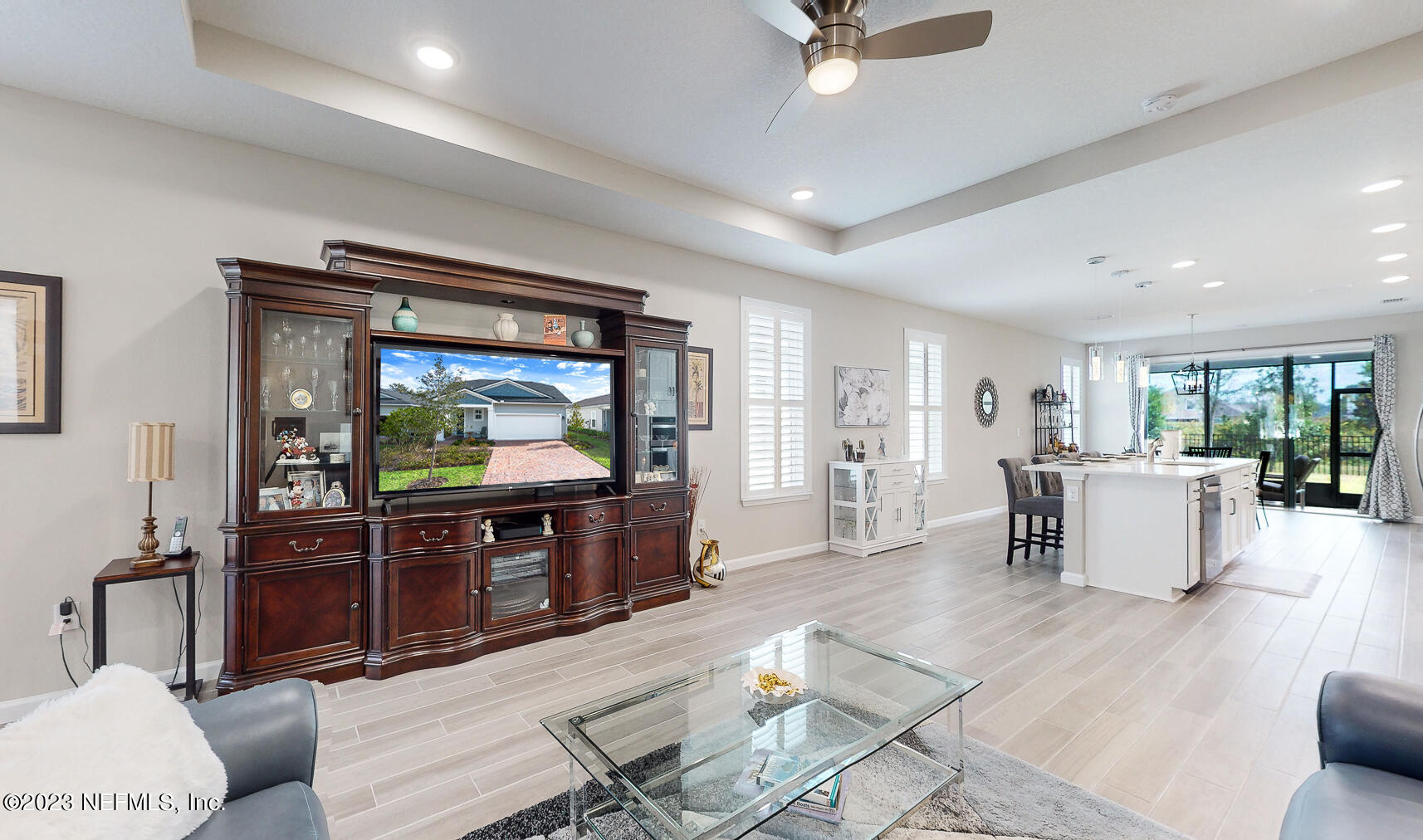 1113 Rustic Ml Drive St. Augustine, FL 32092 - Photo 6 of 62 a living room with furniture and a flat screen tv