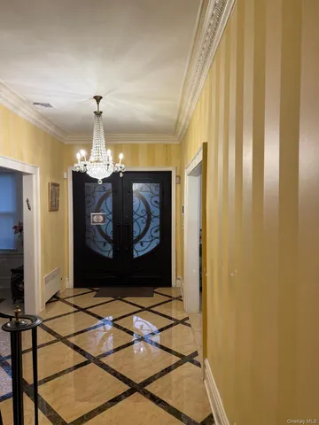 a view of a hallway with a door