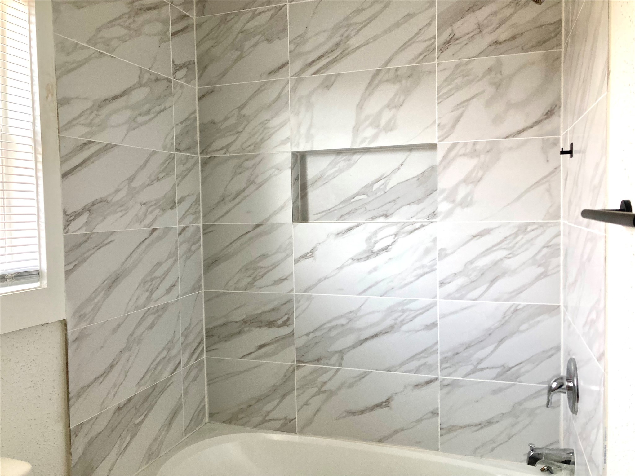 3315 Reeves Street, Unit 3 Houston, TX 77004 - Photo 7 of 8 a bathroom with a shower