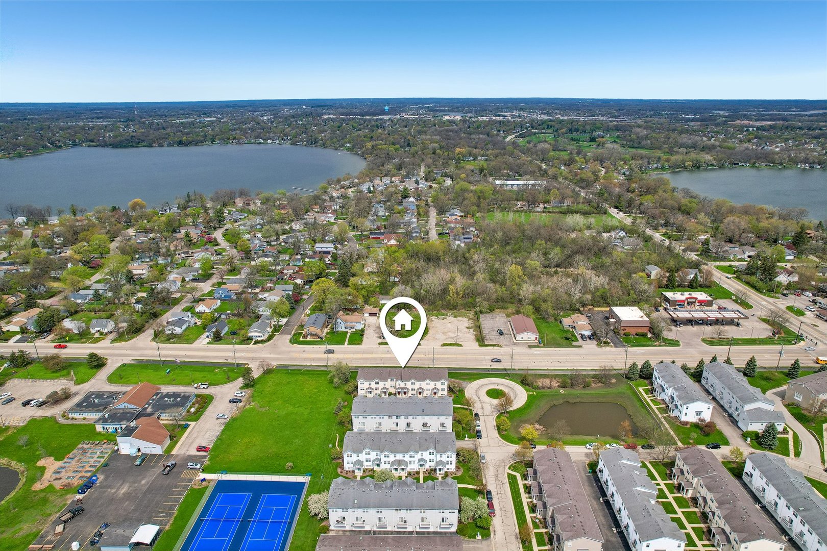 626 Triumph Court Hainesville, IL 60073 - Photo 26 of 32 an aerial view of residential houses with outdoor space