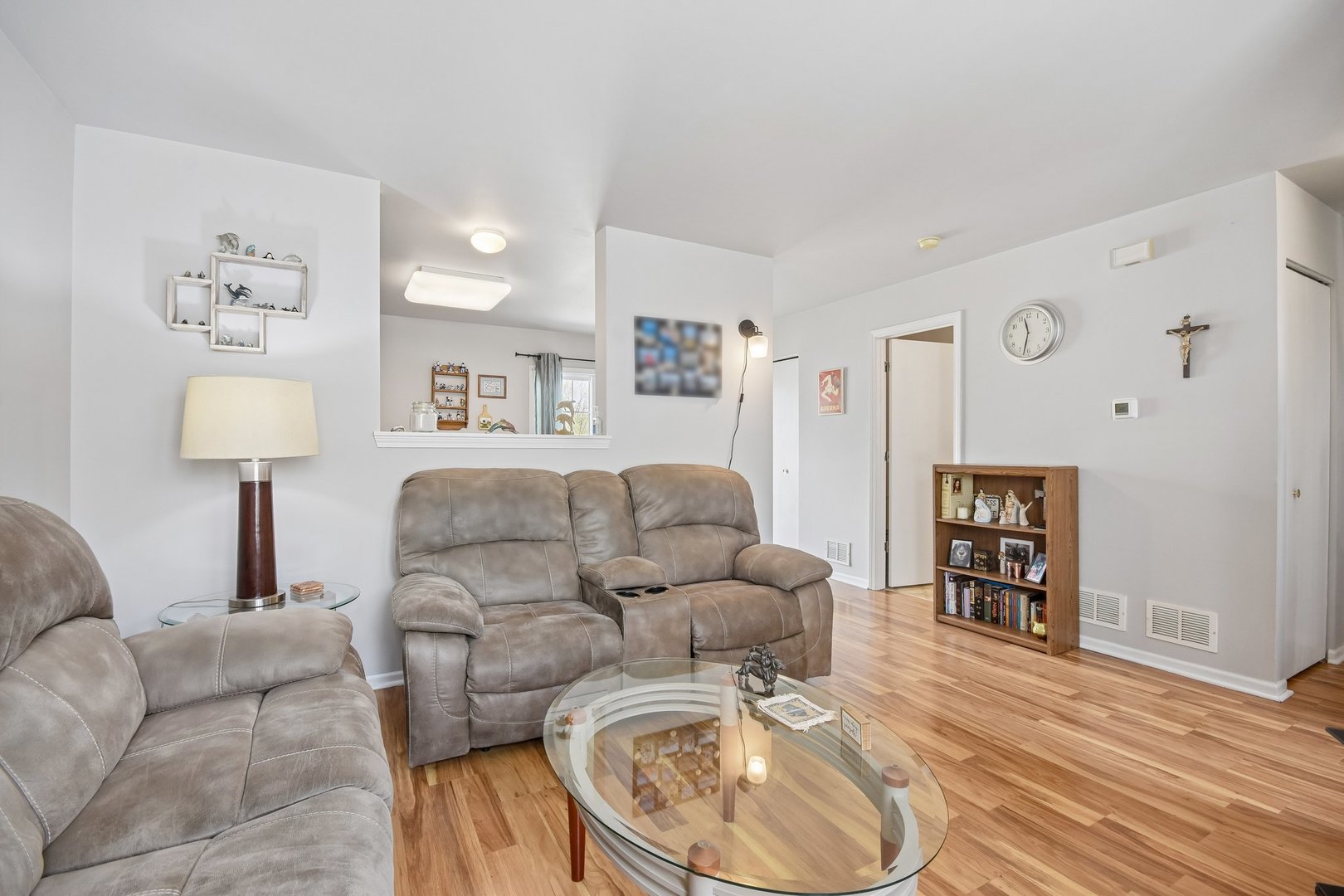 626 Triumph Court Hainesville, IL 60073 - Photo 6 of 32 a living room with furniture and a wooden floor