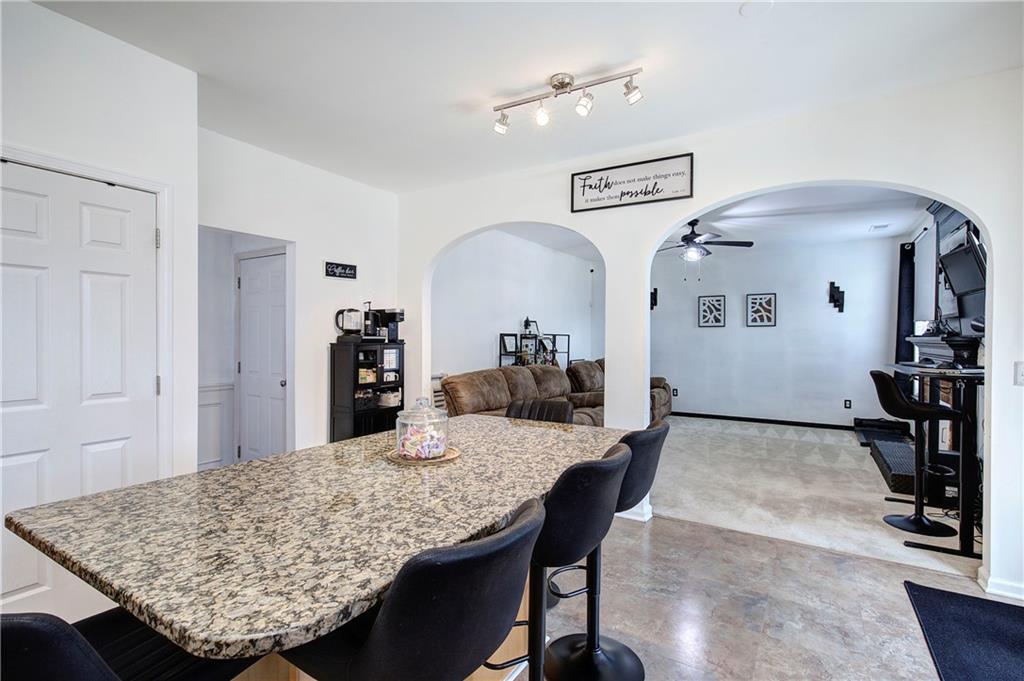 4508 Howell Farms Road Northwest Acworth, GA 30101 - Photo 15 of 42 a view of a dining room with furniture