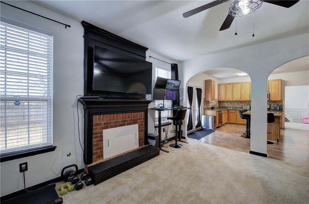 4508 Howell Farms Road Northwest Acworth, GA 30101 - Photo 18 of 42 a view of a livingroom with furniture and a fireplace