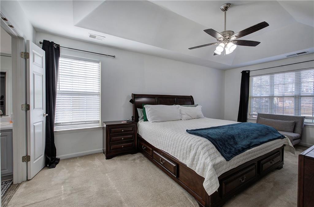 4508 Howell Farms Road Northwest Acworth, GA 30101 - Photo 20 of 42 a bedroom with a bed and a large window